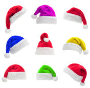 一套多颜色的圣诞老人帽孤立在白色的背景