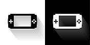 游戏控制台黑白图标与长影子