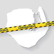 带冠状病毒警告胶带的欧罗巴岛地图。Covid-19爆发