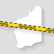 西澳大利亚地图与冠状病毒警告胶带。Covid-19爆发