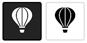 热气球图标上的黑色按钮与白色翻转