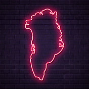 格陵兰地图-砖墙背景上闪烁的霓虹灯