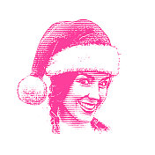 快乐的年轻女子戴着圣诞老人的帽子