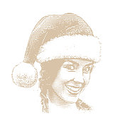 快乐的年轻女子戴着圣诞老人的帽子