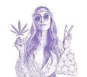成年嬉皮女人拿着大麻叶子