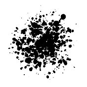 黑色的墨水飞溅在白色的背景上是由单个的粒子形成的。