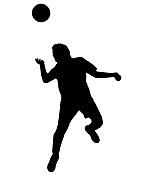 男孩足球运动员用头击球