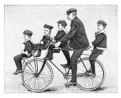 父亲带着四个孩子骑自行车1896年