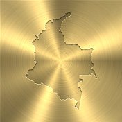 哥伦比亚地图上的黄金背景-圆形拉丝金属纹理 哥伦比亚地图上的黄金背景-圆形拉丝金属纹理