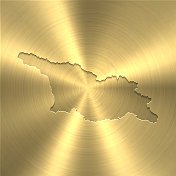 乔治亚地图上的金色背景-圆形拉丝金属纹理
