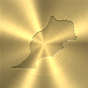 摩洛哥地图上的黄金背景-圆形拉丝金属纹理