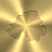 北爱尔兰地图上的金色背景-圆形拉丝金属纹理
