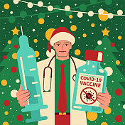 快乐英俊的年轻医生身穿圣诞老人服装，手拿疫苗瓶和注射器抗击冠状病毒(COVID-19，流感病毒)
