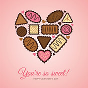 情人节贺卡模板。矢量插图组合巧克力糖果在粉红色的背景心形。