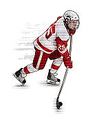 冰球运动员溜冰和射击冰球 冰球运动员溜冰和射击冰球