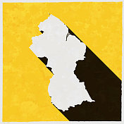 圭亚那地图与纹理黄色背景上的长阴影