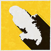 马提尼克地图与纹理黄色背景上的长阴影