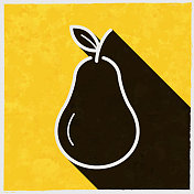 梨。图标与长阴影的纹理黄色背景
