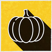 南瓜。图标与长阴影的纹理黄色背景