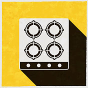 煤气炉顶视图。图标与长阴影的纹理黄色背景