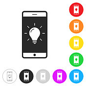 有灯泡的智能手机。彩色按钮上的图标