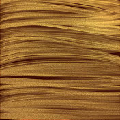 金色抽象奶油背景。金光飞扬的特写镜头。 金色抽象奶油背景。金光飞扬的特写镜头。