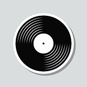 黑胶唱片。图标贴纸在灰色背景 黑胶唱片。图标贴纸在灰色背景