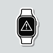 带有危险警告注意的智能手表。图标贴纸在灰色背景