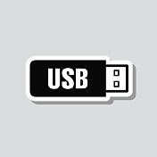 USB闪存驱动器。图标贴纸在灰色背景