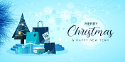圣诞快乐和新年快乐舞台与购物袋和礼物