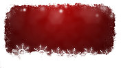 白色褶边边界的雪和空灵闪亮的圣诞雪花在充满活力的暗栗色红色水平闪耀圣诞背景