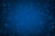 气泡或空灵的闪光点和雪花形状图案的圣诞主题在深蓝的午夜水平闪光节日圣诞背景或墙纸