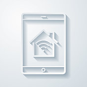 带有智能家居的平板电脑。空白背景上剪纸效果的图标 带有智能家居的平板电脑。空白背景上剪纸效果的图标