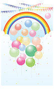 彩虹下五颜六色的气球