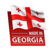 在格鲁吉亚制造-矢量插图。格鲁吉亚国旗和文字孤立在白色背景上