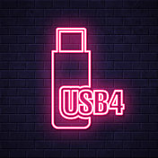 usb闪存盘。在砖墙背景上发光的霓虹灯图标