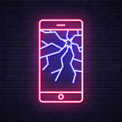 屏幕破碎的智能手机。在砖墙背景上发光的霓虹灯图标