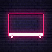 电视。在砖墙背景上发光的霓虹灯图标