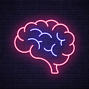大脑。在砖墙背景上发光的霓虹灯图标