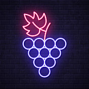 葡萄。在砖墙背景上发光的霓虹灯图标