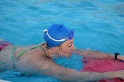 woman practicing swimming