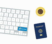 键盘与现在预订按钮为在线预订。高角度的桌子与护照，电脑键盘和咖啡杯