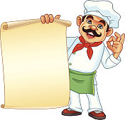厨师手握羊皮纸菜单 厨师手握羊皮纸菜单