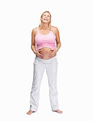 笑成熟的孕妇抱着肚子，向上看