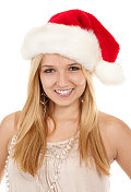 美丽的少女戴着圣诞帽