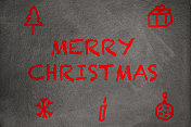黑板上用粉笔写着:圣诞快乐