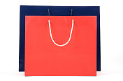 红色购物袋后面有一个蓝色的